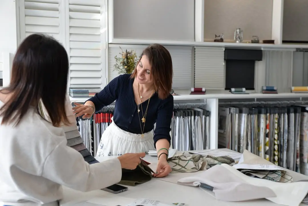 Zara customer consultation with window furnishing samples